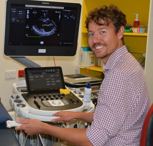Dr Bradley McDonald reviewing an echocardiogram