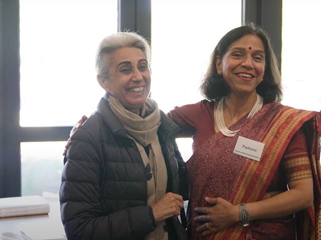 Two Child and Adolescent Health Service Community Ambassadors smiling with their arms around each other. 