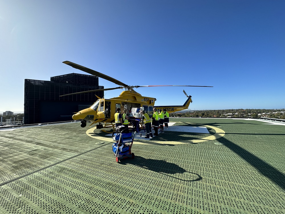 The NETS WA team loading a newborn patient into the RAC rescue helicopter