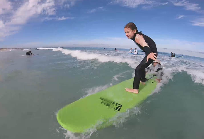 Mary surfing as part of a research project to improve the lives of patients with cystic fibrosis