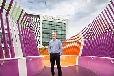 Dr Andrew Martin standing on The Kids' Bridge